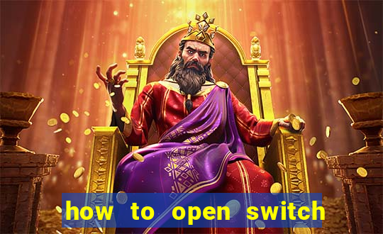 how to open switch oled game card slot