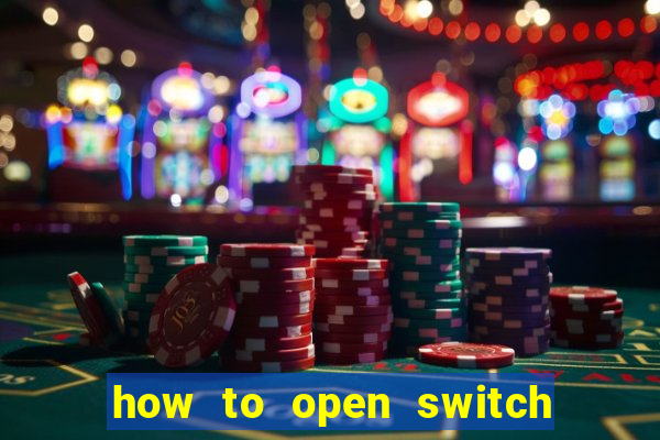 how to open switch oled game card slot